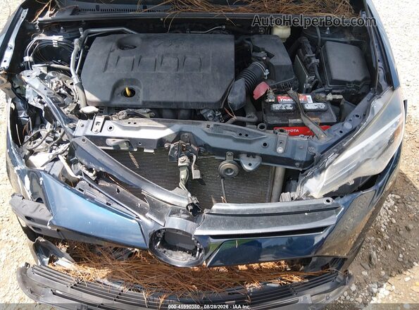 2T1BURHE4HC910639 2017 TOYOTA COROLLA Black Rear view
