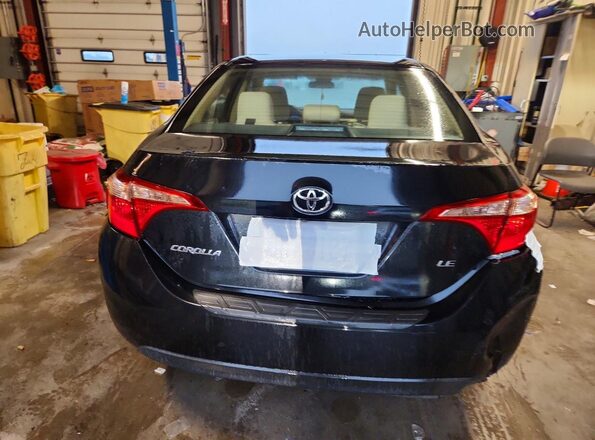 2T1BURHE4HC915131 2017 TOYOTA COROLLA Black Rear view