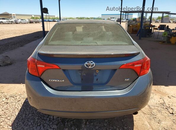 2T1BURHE4HC941289 2017 TOYOTA COROLLA Gray Вид ззаду