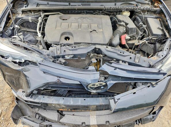 2T1BURHE4HC942409 2017 TOYOTA COROLLA Black Вид задньої частини салону