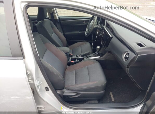 2T1BURHE4HC950915 2017 TOYOTA COROLLA Gray Front interior view