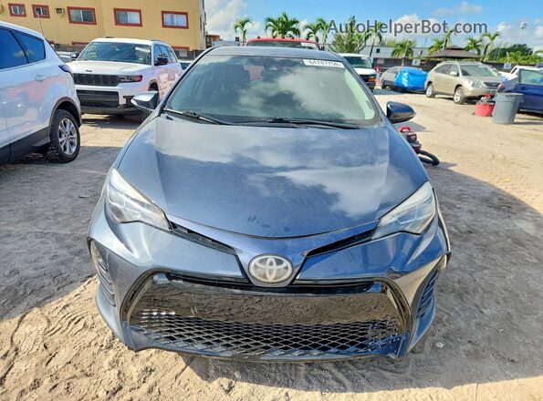 2T1BURHE4JC001807 2018 TOYOTA COROLLA Серый Вид спереди