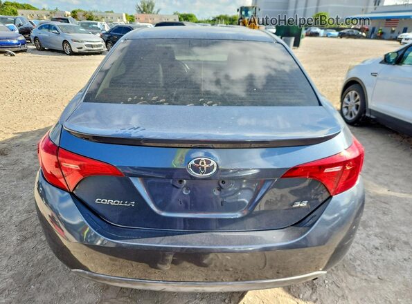 2T1BURHE4JC001807 2018 TOYOTA COROLLA Серый Вид сзади