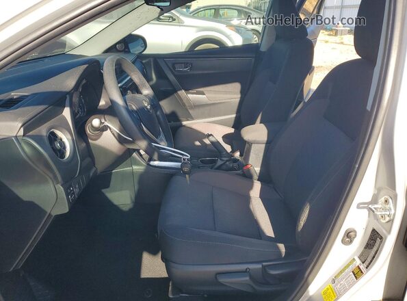 2T1BURHE4JC043197 2018 TOYOTA COROLLA Silver Vista interior delantera