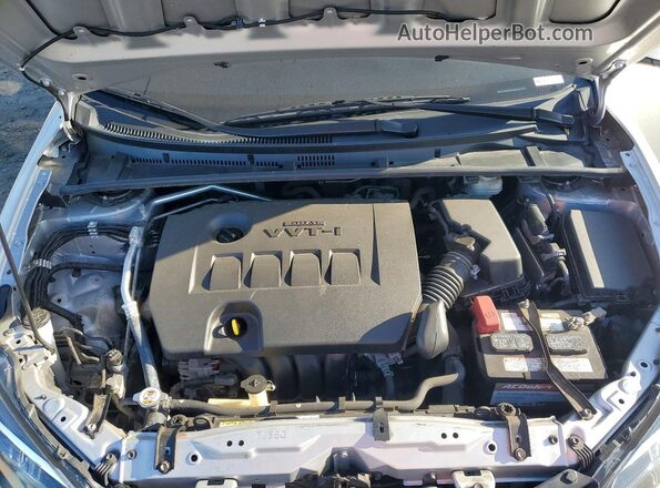 2T1BURHE4JC043197 2018 TOYOTA COROLLA Silver Vista interior trasera