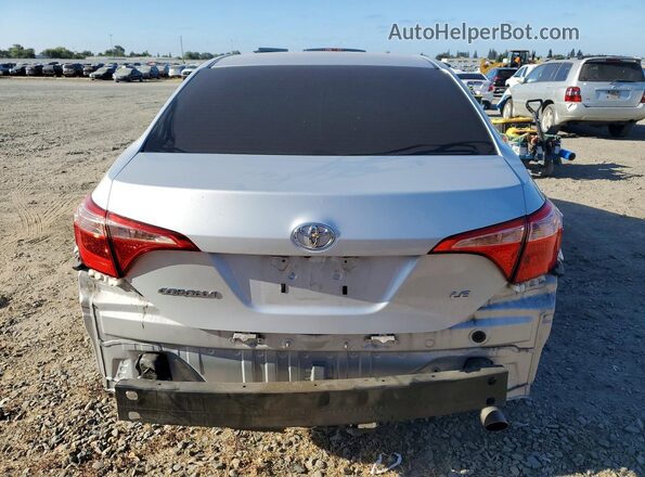2T1BURHE4JC043197 2018 TOYOTA COROLLA Silver Vista trasera