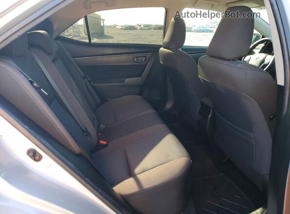 2T1BURHE4JC043197 2018 TOYOTA COROLLA Silver Vista de los asientos traseros
