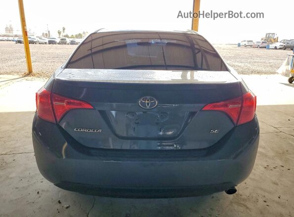 2T1BURHE4JC069072 2018 TOYOTA COROLLA Gray Rear view