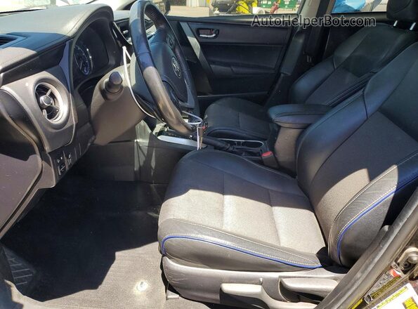 2T1BURHE4JC997030 2018 TOYOTA COROLLA Black წინა სალონის ხედი