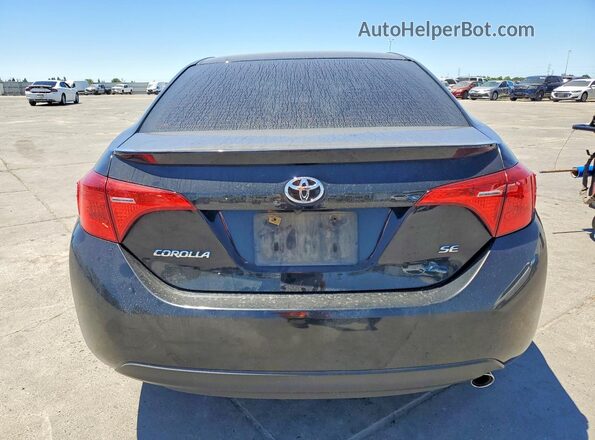 2T1BURHE4JC997030 2018 TOYOTA COROLLA Black უკანა ხედი