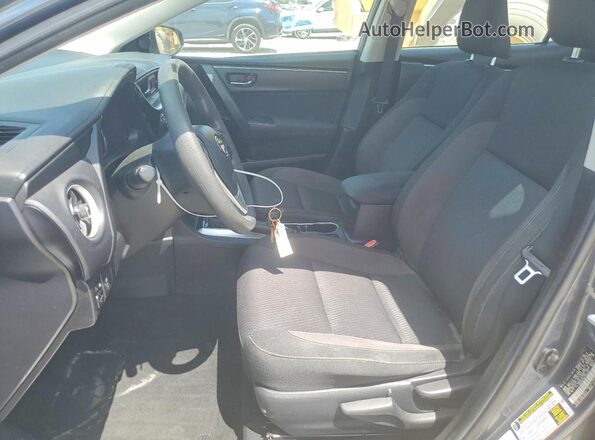 2T1BURHE4KC164572 2019 TOYOTA COROLLA Серый Вид салона спереди