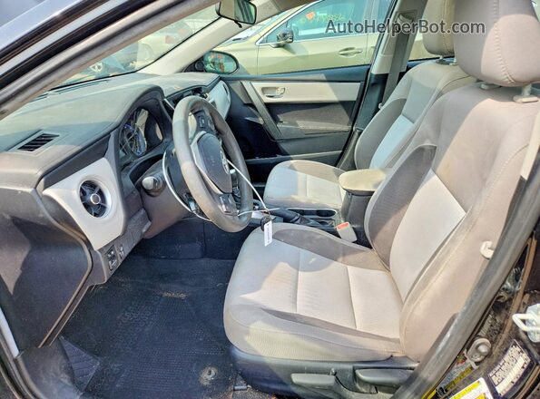 2T1BURHE4KC202334 2019 TOYOTA COROLLA Black Front interior view