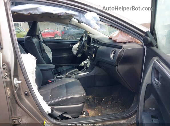 2T1BURHE5JC014808 2018 TOYOTA COROLLA Серый Вид салона спереди