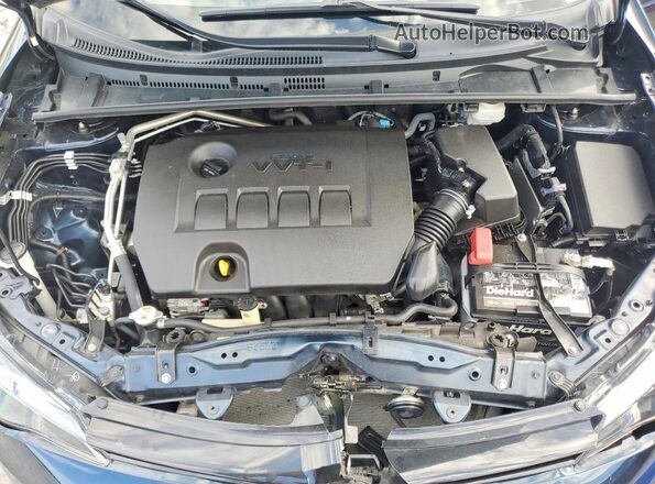 2T1BURHE5JC018390 2018 TOYOTA COROLLA Blue Սալոնի հետևի տեսք