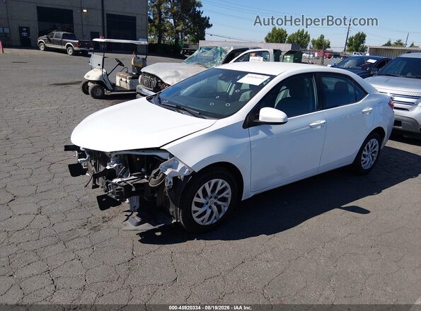 2T1BURHE5JC022472 2018 TOYOTA COROLLA White Vista tres cuartos delantera izquierda