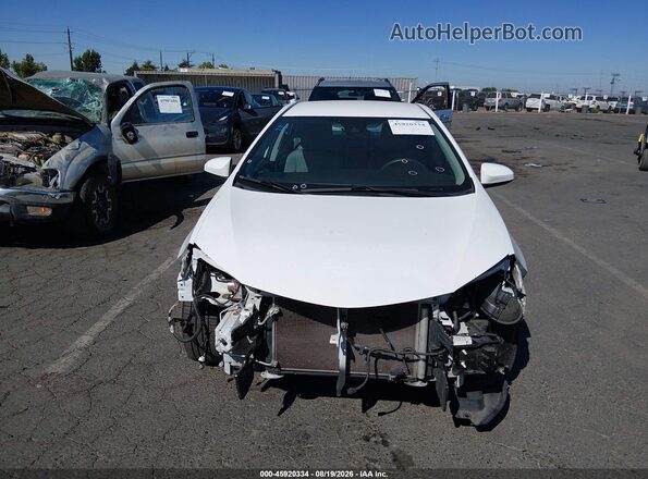 2T1BURHE5JC022472 2018 TOYOTA COROLLA White Vista frontal