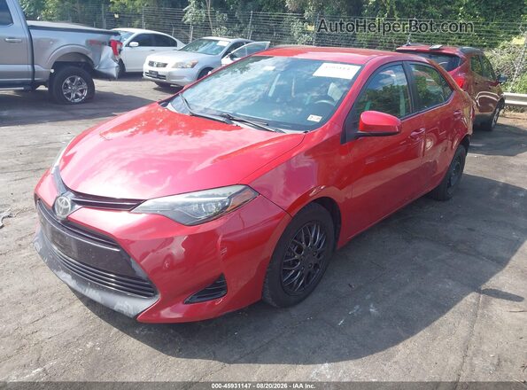 2T1BURHE5JC057111 2018 TOYOTA COROLLA Red Vista tres cuartos delantera izquierda