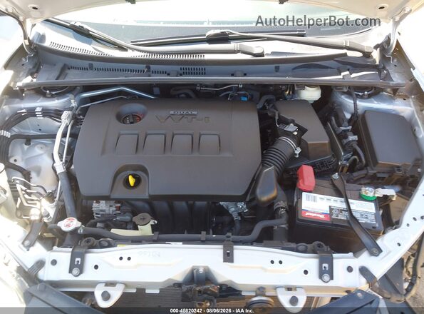 2T1BURHE5JC120921 2018 TOYOTA COROLLA Silver Rear view