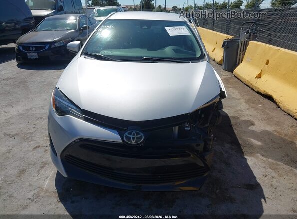 2T1BURHE5JC120921 2018 TOYOTA COROLLA Silver Dashboard view