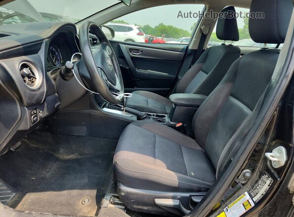 2T1BURHE5KC160711 2019 TOYOTA COROLLA Black Front interior view