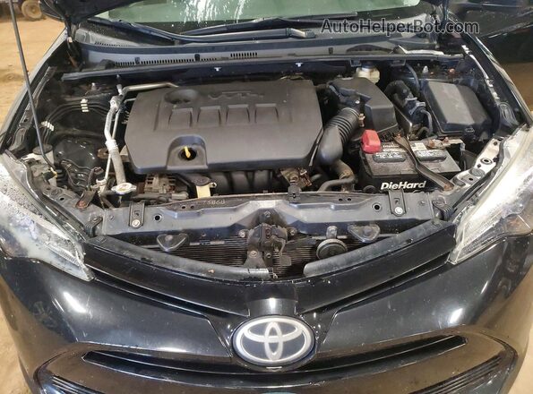 2T1BURHE6HC843221 2017 TOYOTA COROLLA Black Vista interior trasera