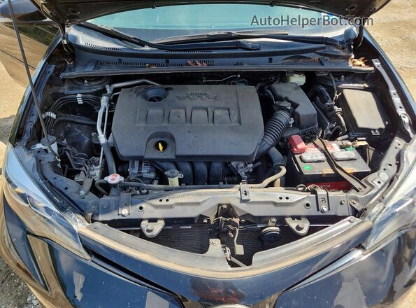 2T1BURHE6HC844417 2017 TOYOTA COROLLA Черный Вид задней части салона