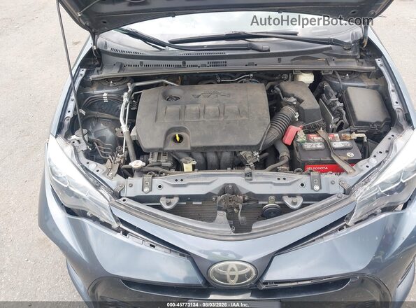 2T1BURHE6HC867163 2017 TOYOTA COROLLA Gray Widok z tyłu