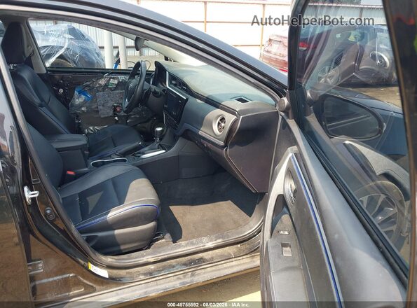 2T1BURHE6HC911789 2017 TOYOTA COROLLA Black Front interior view