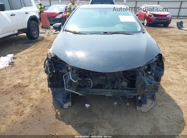 2T1BURHE6HC911789 2017 TOYOTA COROLLA Black Rear interior view