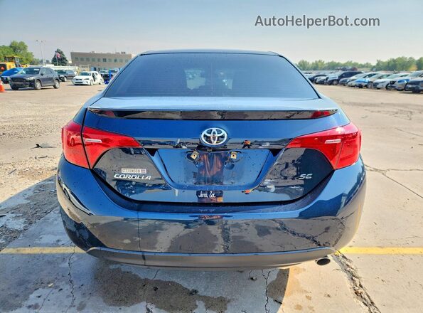 2T1BURHE6HC950298 2017 TOYOTA COROLLA Синий Вид сзади