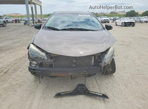 2T1BURHE6JC014977 2018 TOYOTA COROLLA Brown Front view