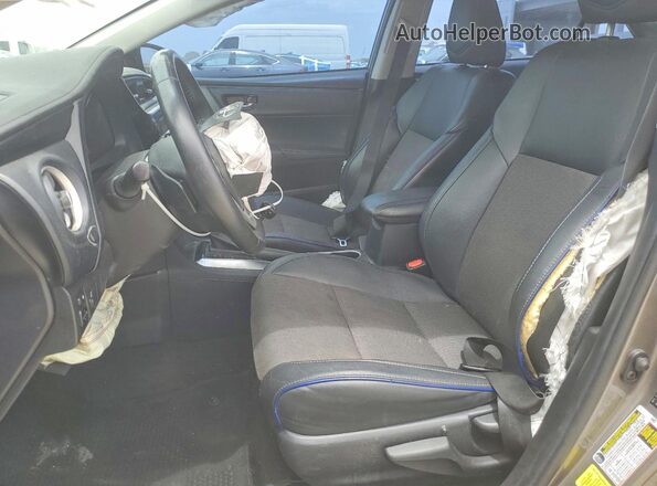 2T1BURHE6JC014977 2018 TOYOTA COROLLA Brown Front interior view