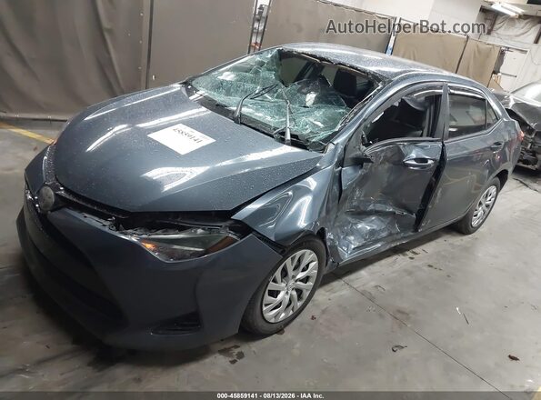 2T1BURHE6JC016776 2018 TOYOTA COROLLA Gray Vista tres cuartos delantera izquierda