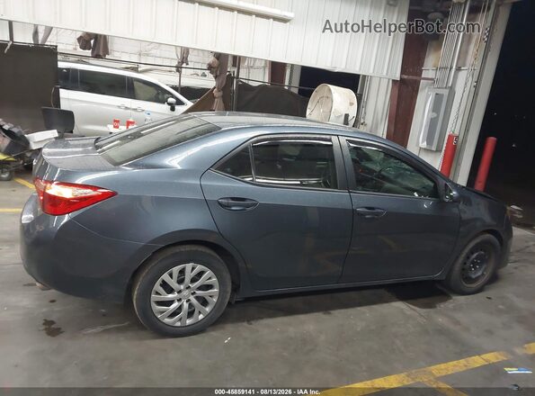 2T1BURHE6JC016776 2018 TOYOTA COROLLA Gray Vista interior trasera