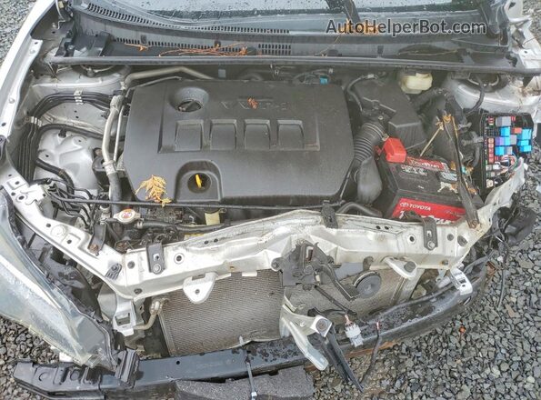2T1BURHE6JC090005 2018 TOYOTA COROLLA Silver უკანა სალონის ხედი