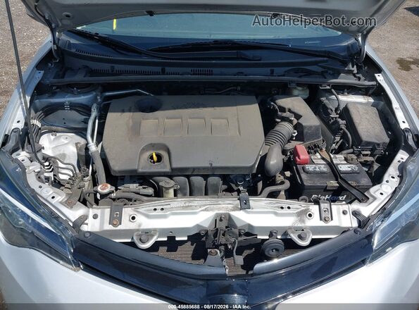 2T1BURHE6JC988023 2018 TOYOTA COROLLA Silver Вид ззаду