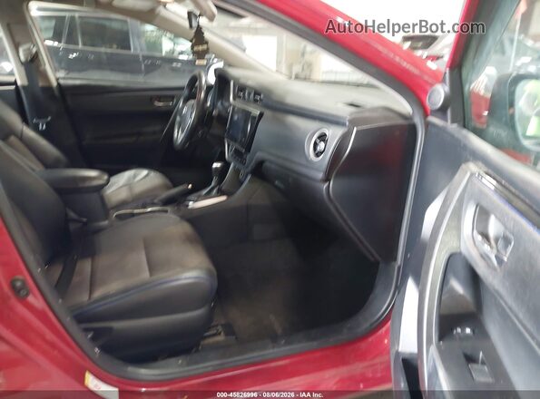 2T1BURHE6JC988913 2018 TOYOTA COROLLA Red Front interior view