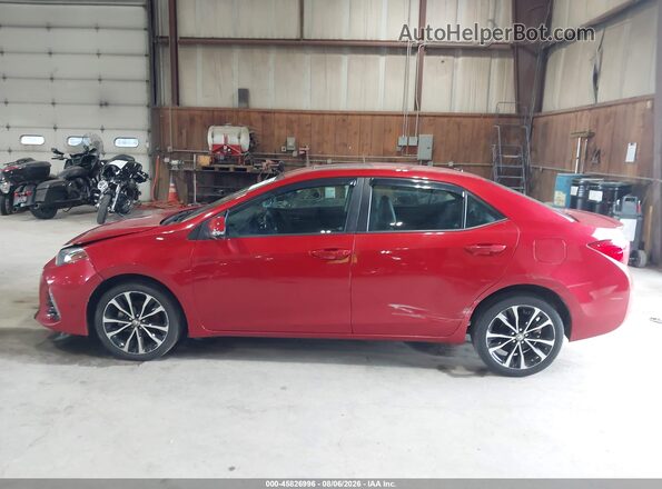 2T1BURHE6JC988913 2018 TOYOTA COROLLA Red Rear interior view