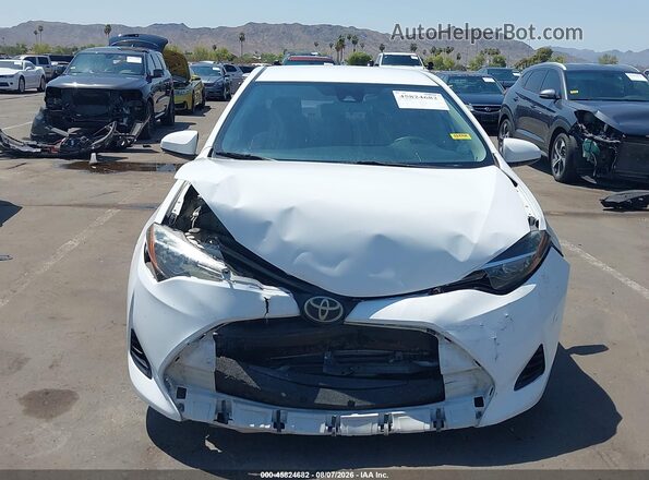 2T1BURHE6KC128088 2019 TOYOTA COROLLA White Front view