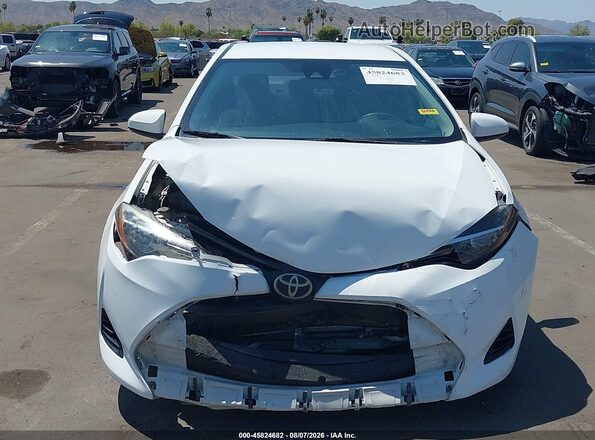 2T1BURHE6KC128088 2019 TOYOTA COROLLA White Rear interior view