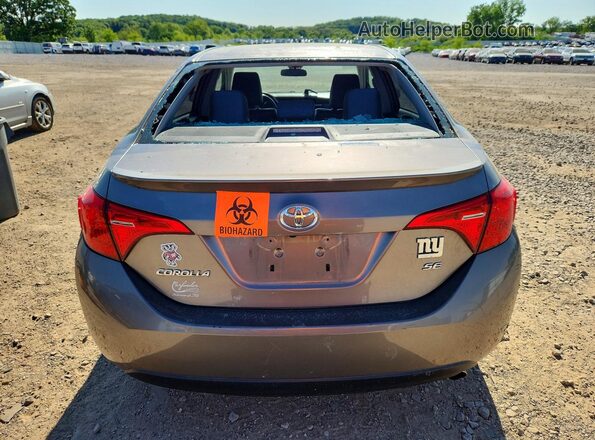 2T1BURHE6KC238199 2019 TOYOTA COROLLA Silver უკანა ხედი
