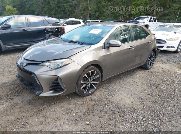 2T1BURHE7HC830672 2017 TOYOTA COROLLA Tan წინა მარცხენა ხედი სამი მეოთხედიდან