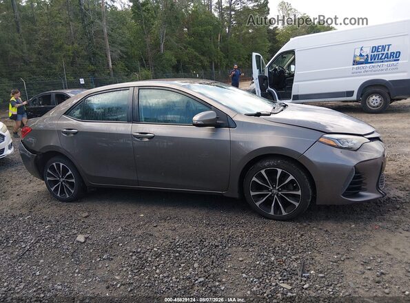 2T1BURHE7HC830672 2017 TOYOTA COROLLA Tan უკანა სალონის ხედი