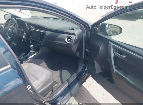 2T1BURHE7HC894923 2017 TOYOTA COROLLA Black Front interior view