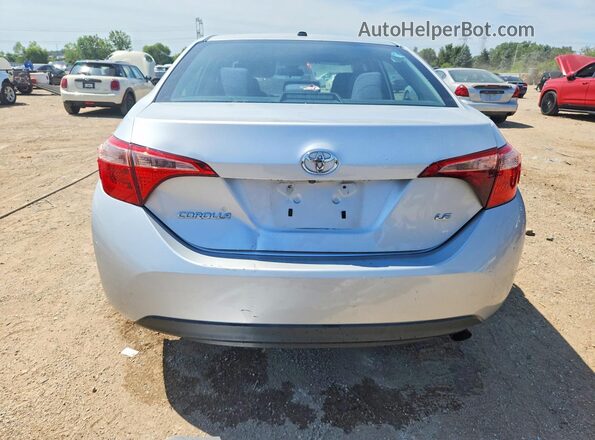2T1BURHE7JC028595 2018 TOYOTA COROLLA Silver Вид ззаду