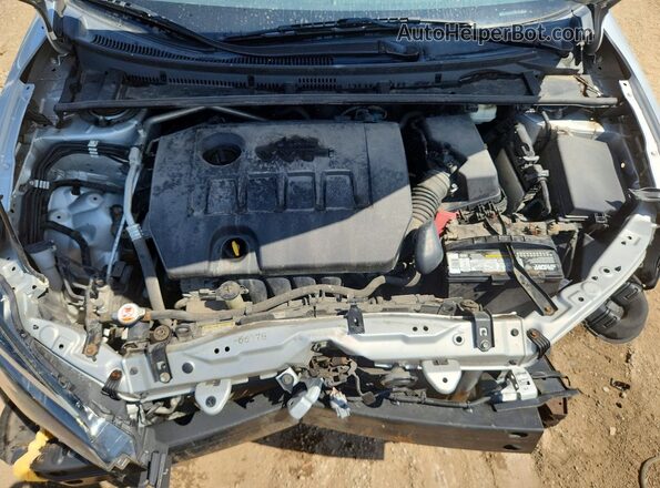 2T1BURHE7JC028595 2018 TOYOTA COROLLA Silver Вид задньої частини салону