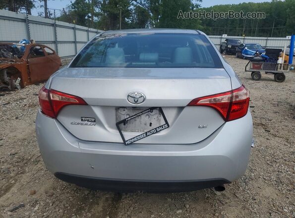 2T1BURHE7JC059667 2018 TOYOTA COROLLA Silver Rear view