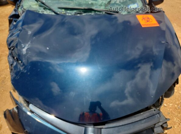 2T1BURHE7JC066893 2018 TOYOTA COROLLA Blue Rear interior view