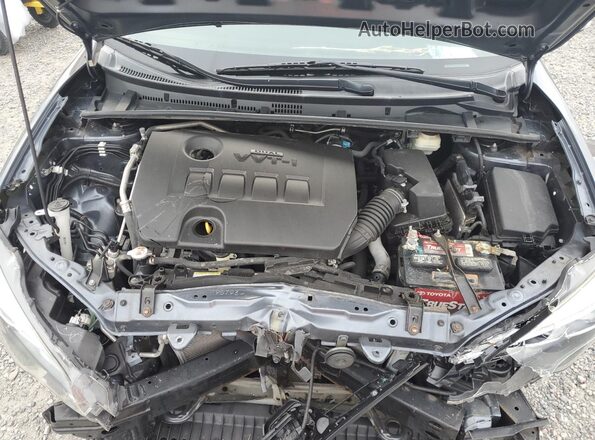 2T1BURHE7JC067610 2018 TOYOTA COROLLA Gray Vista interior trasera