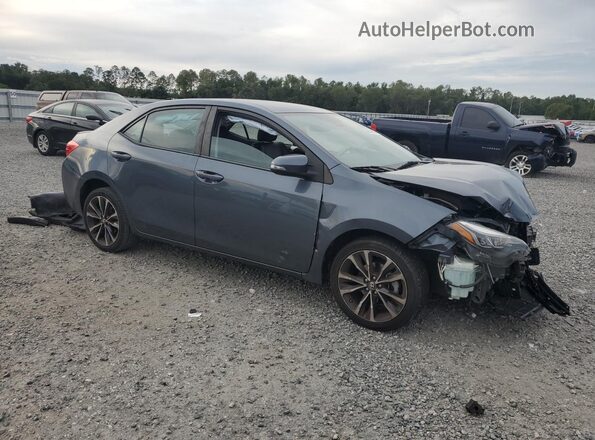 2T1BURHE7JC067610 2018 TOYOTA COROLLA Gray Delantero derecho
